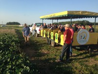 Mike Ostlie, research agronomist, speaks to visitors during the 2017 row crop field tour at NDSU's Carrington Research Extension Center. (NDSU photo)