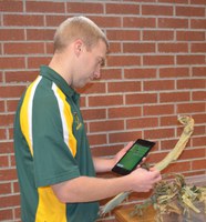 Andrew Friskop, NDSU Extension plant pathologist, demonstrates how to use the NDSU Pest Management app. (NDSU photo)