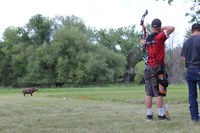 A 4-H'er takes aim at a target during the 2018 North Dakota State 4-H Archery Championships. (NDSU photo)