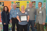 The Ralph and Deane Haugen family is recognized as a North Dakota 4-H Family. Pictured are (from left): Penny Dale, North Dakota 4-H Foundation manager; Ralph Haugen; Deane Haugen; Matthew Haugen; and Greg Lardy, North Dakota State University Extension interim director. (NDSU photo)