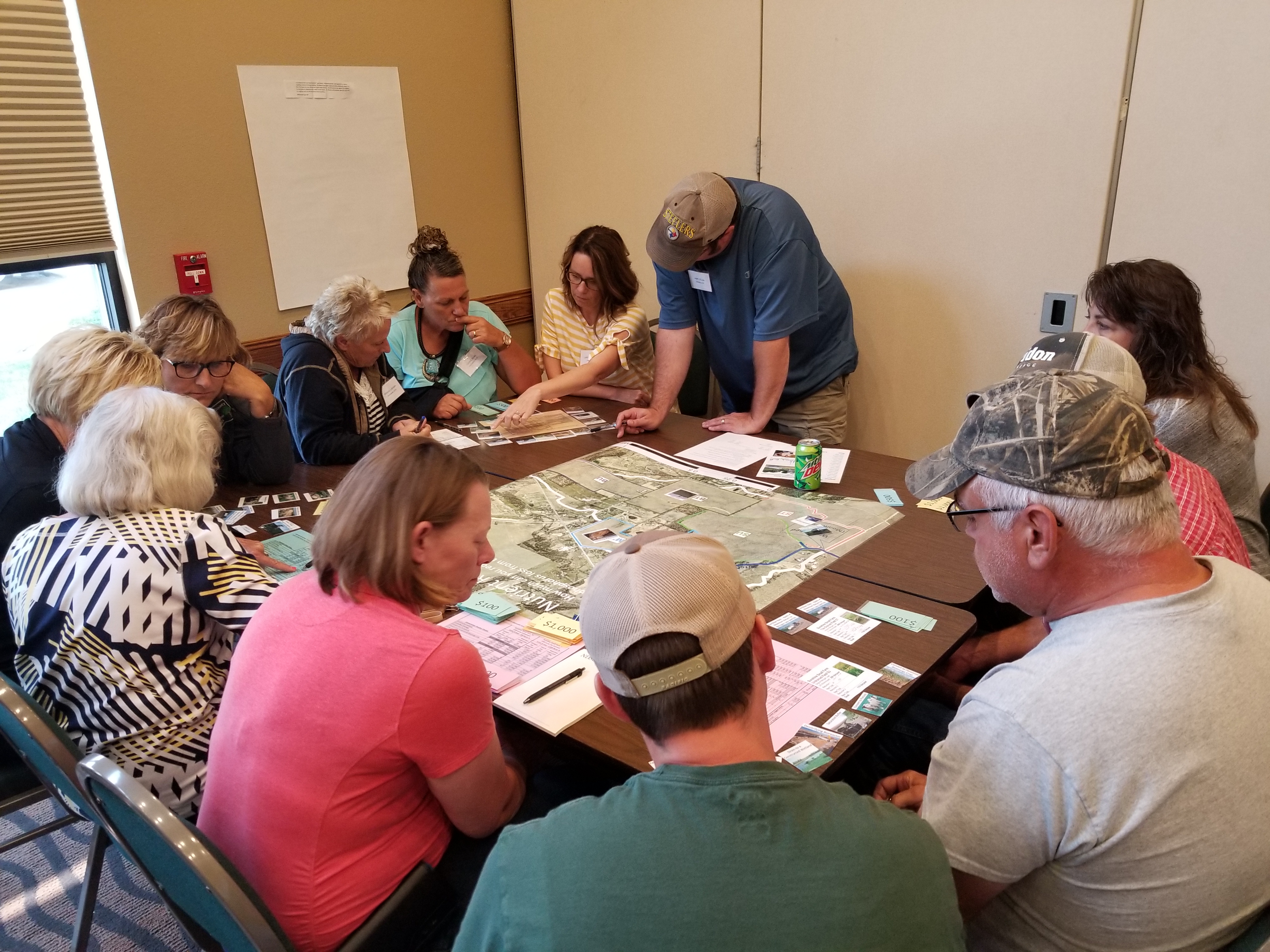 Participants in NDSU Extension's North Dakota Soil and Water Conservation Leadership Academy work on a hands-on exercise. (NDSU photo)
