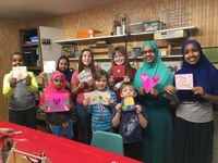 Members of the Uniters 4-H Club in Cass County display the “get well” cards they made for children in a local hospital. (NDSU photo)