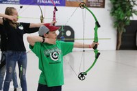 Noah Crain, a McKenzie County 4-H member, takes aim at the North Dakota 4-H Archery Indoor Championships.