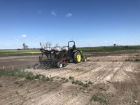 NDSU researchers seed a reclamation study site near Glenburn, N.D. (NDSU photo)