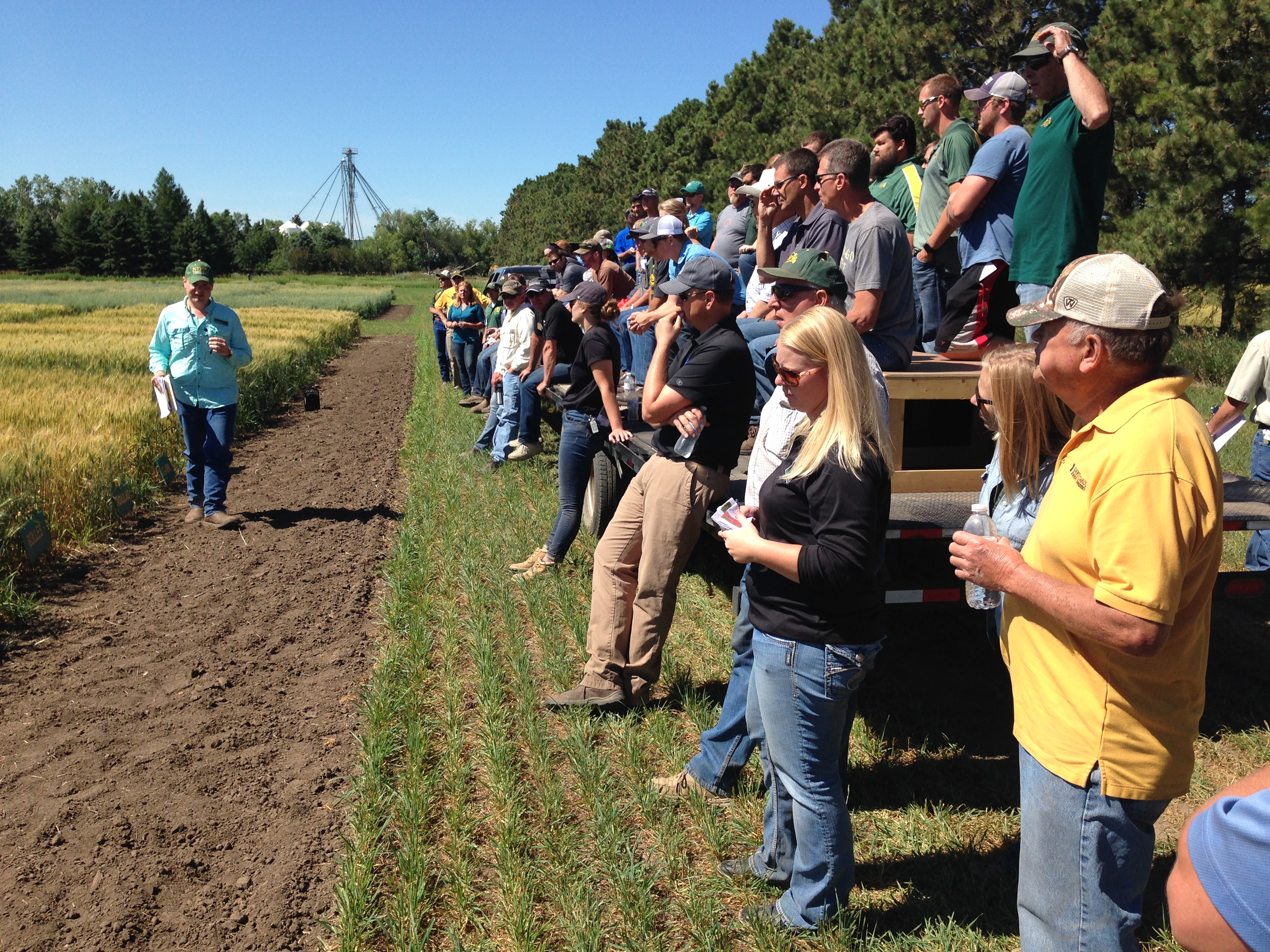 Andrew Green, NDSU spring wheat breeder, speaks to visitors at the Carrington Research Extension Center. (NDSU photo)