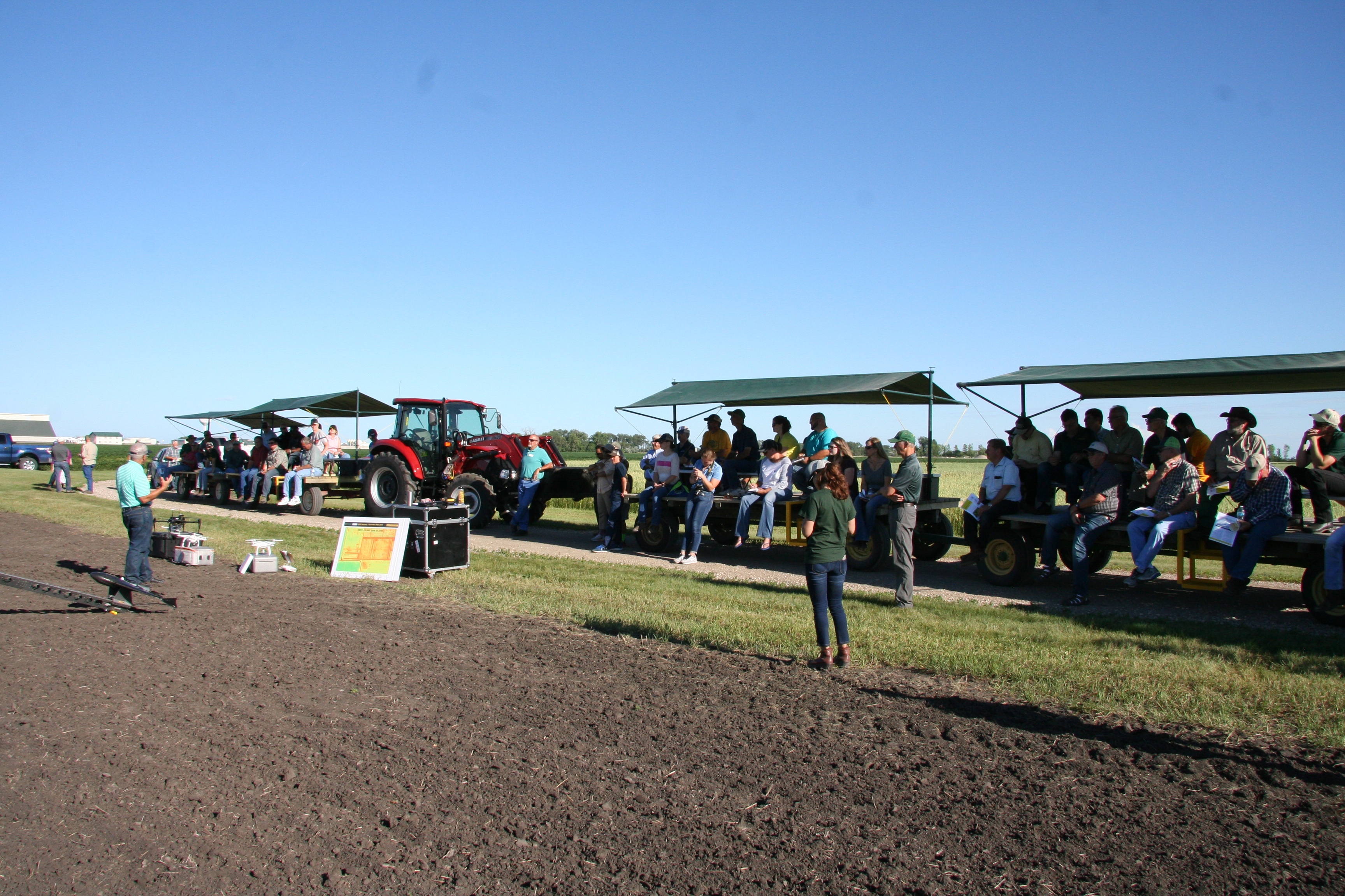 John Nowatzki, NDSU Extension agricultural machine systems specialist, demonstrates unmanned aerial vehicles during a field tour at the NDSU Agronomy Seed Farm. (NDSU photo)