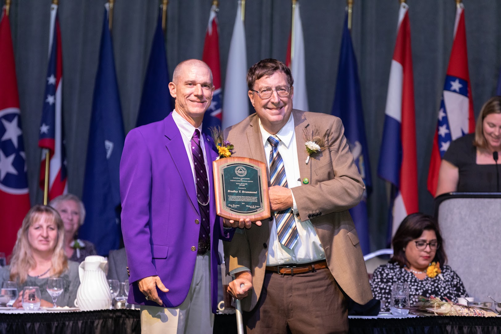 Brad Brummond, right, is named to the National Association of County Agricultural Agents' Hall of Fame. (NDSU photo)