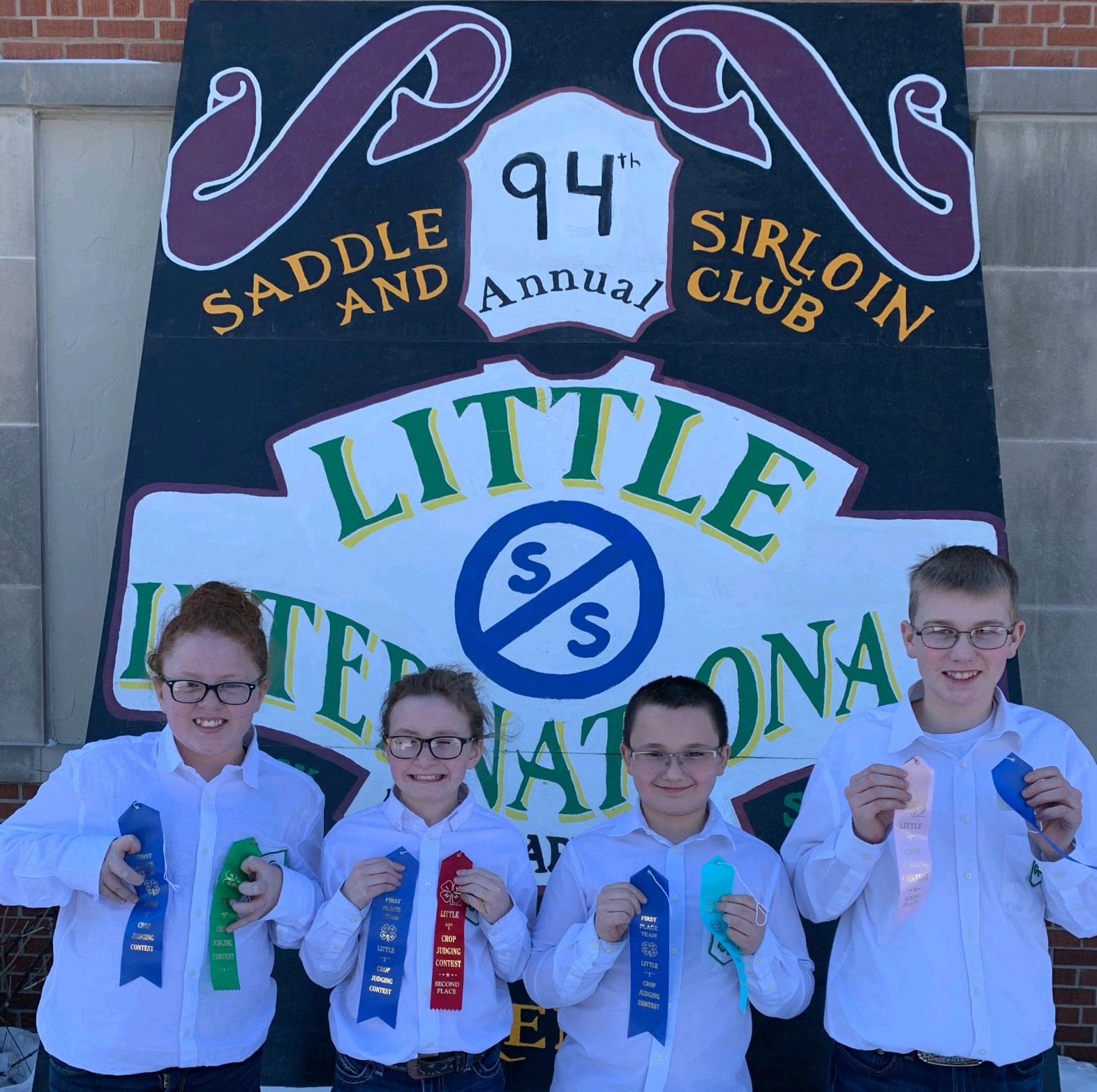 The Ward County team placed first in the junior division of the Little I 4-H crop judging contest. Pictured are, from left: Makayla White, Abby Finke, Daylon Yanish and Mark Schauer. (NDSU photo)