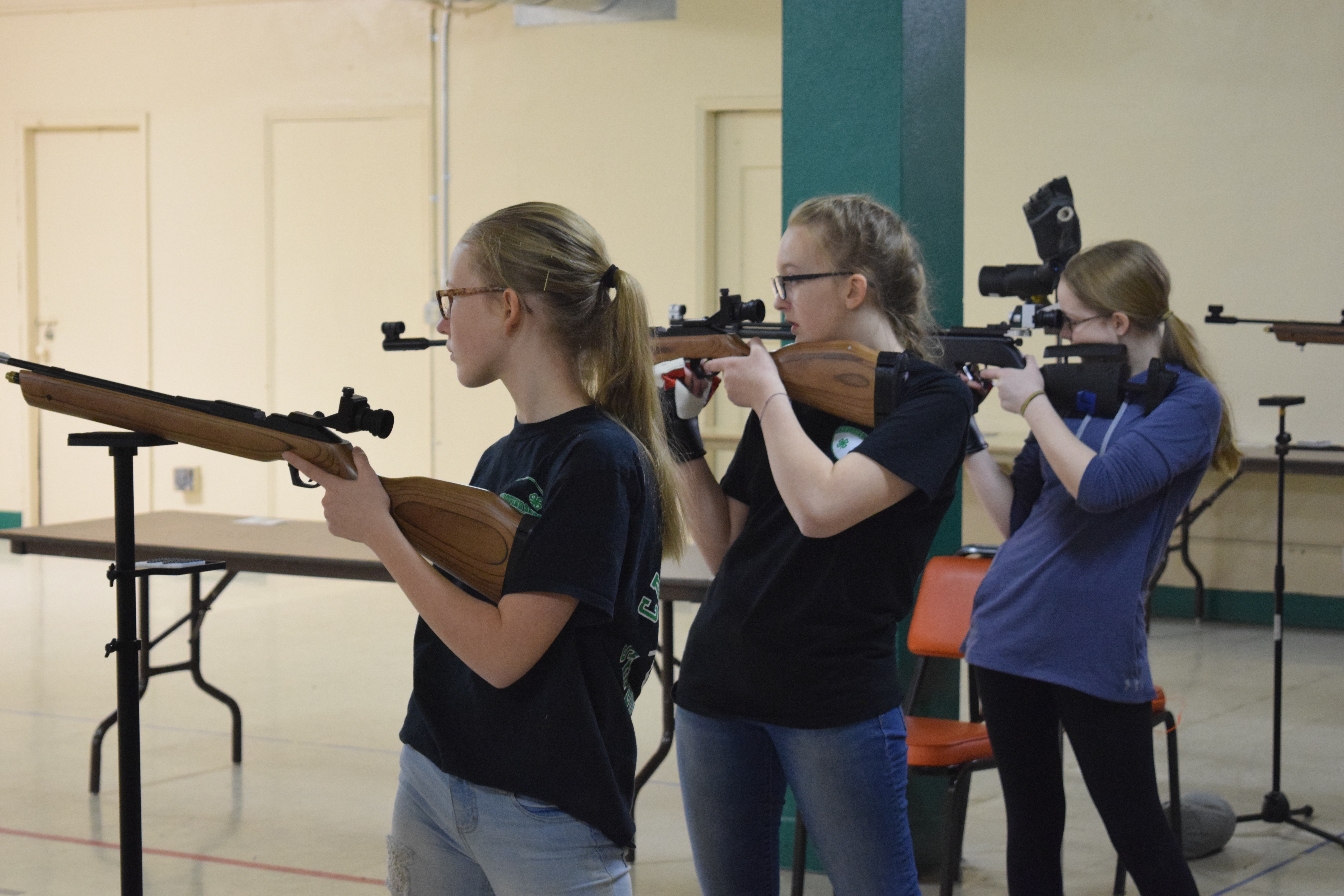 North Dakota 4-H'ers take aim in air rifle competition. (NDSU photo)