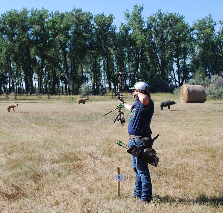 A 4-H'er takes aim at the North Dakota State 4-H Archery Championships held at the North Dakota 4-H Camp near Washburn. (NDSU photo)