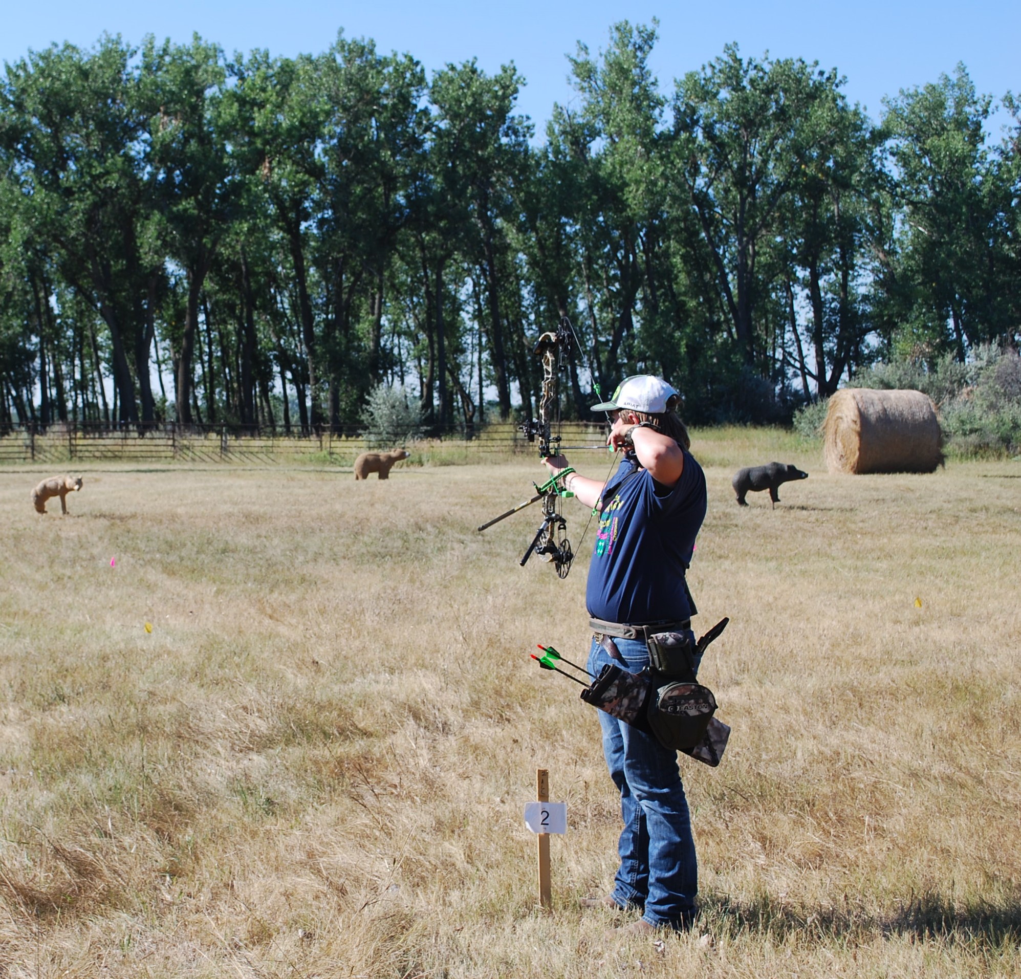 A 4-H'er takes aim at the North Dakota State 4-H Archery Championships held at the North Dakota 4-H Camp near Washburn. (NDSU photo)