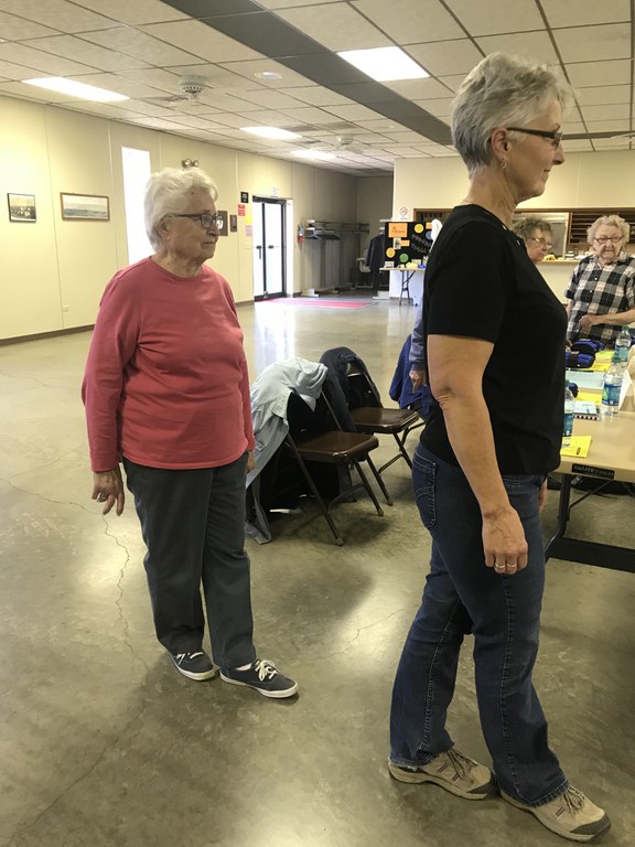 Older adults practice their balance during a Stepping On program. (NDSU photo)