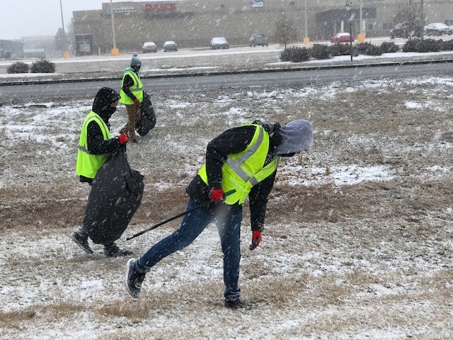 North Dakota 4-H Ambassadors clean trash from ditches in Bismarck as a community service project. (NDSU photo)