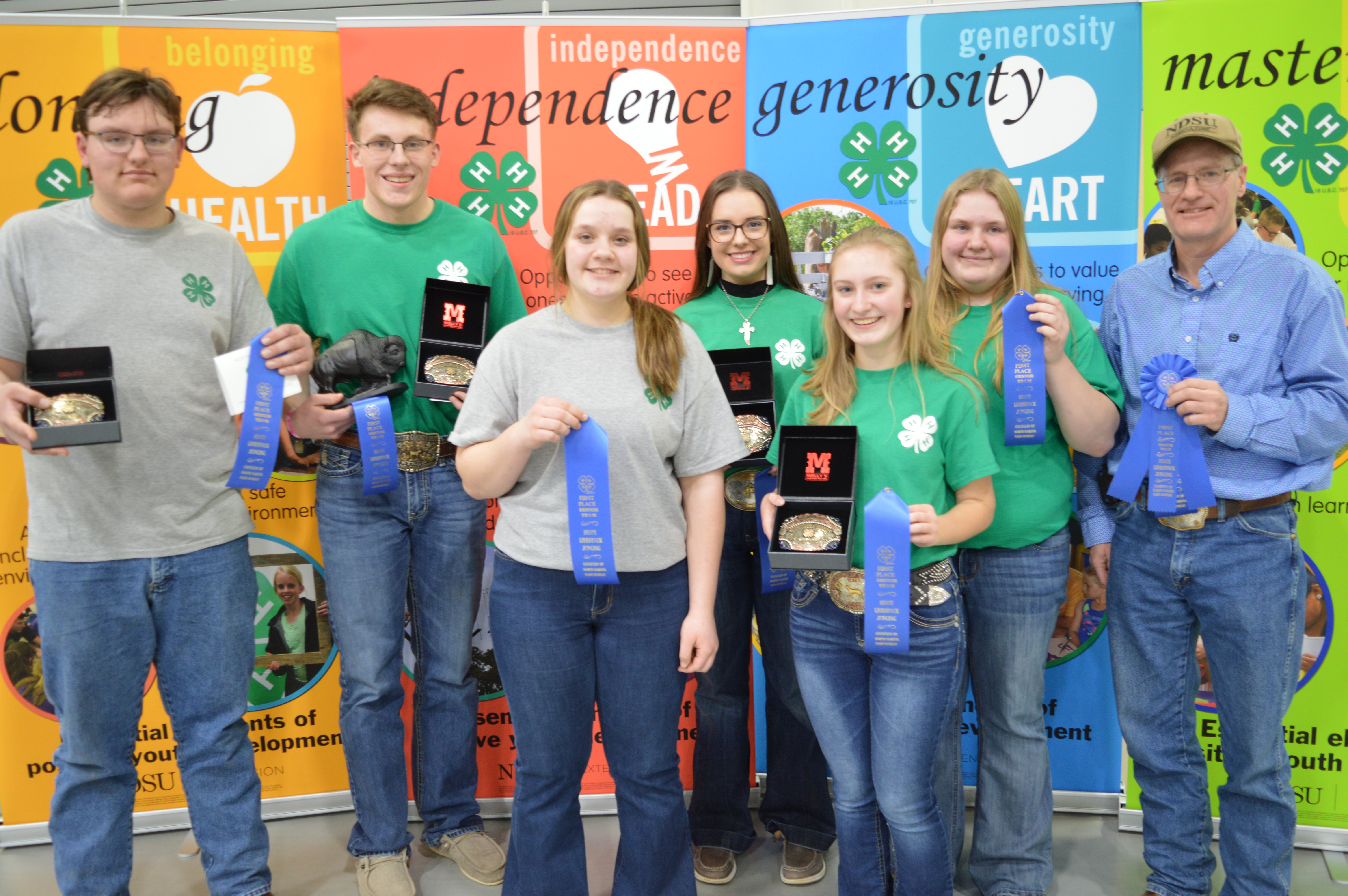 The Oliver County 4-H team took first place in the senior division of the state 4-H livestock judging contest held in Watford City, N.D. Pictured are, from left: Wilton Henke, Jacob Klaudt, Sidney Erickson, Karlee Sailer, Reanna Schmidt, Catie Erickson and coach Rick Schmidt. (NDSU photo)