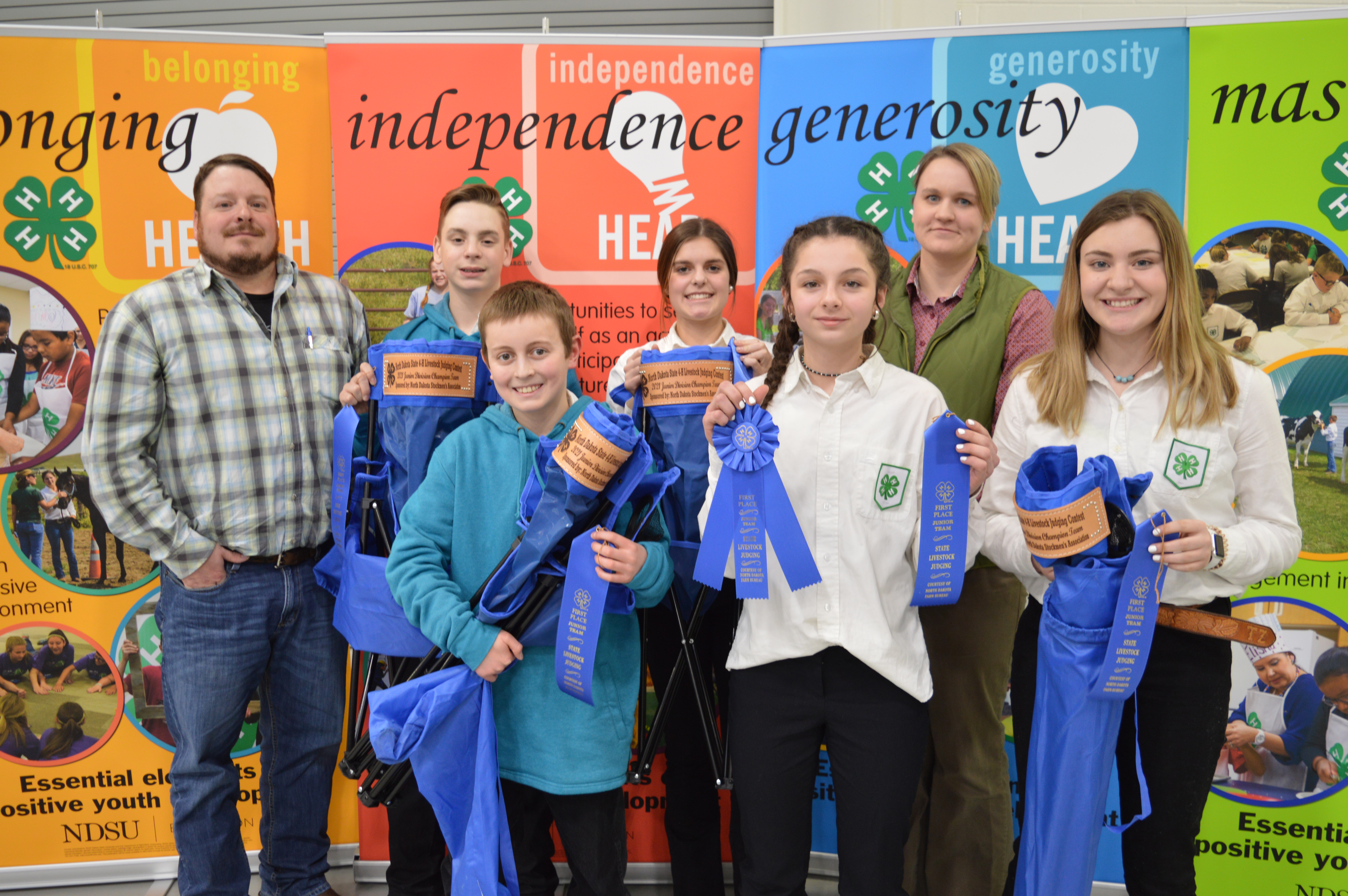The Grant County 4-H team took first place in the junior division of the state 4-H livestock judging contest held in Watford City, N.D. Pictured are, from left, back row: Steven Zenker (coach), Landan Zenker, Kaitlyn Hauge and Tessa Osterbauer (Grant County Extension agent); front row, Layton Redmann, Addison Dahners and Taylor Zenker. (NDSU photo)