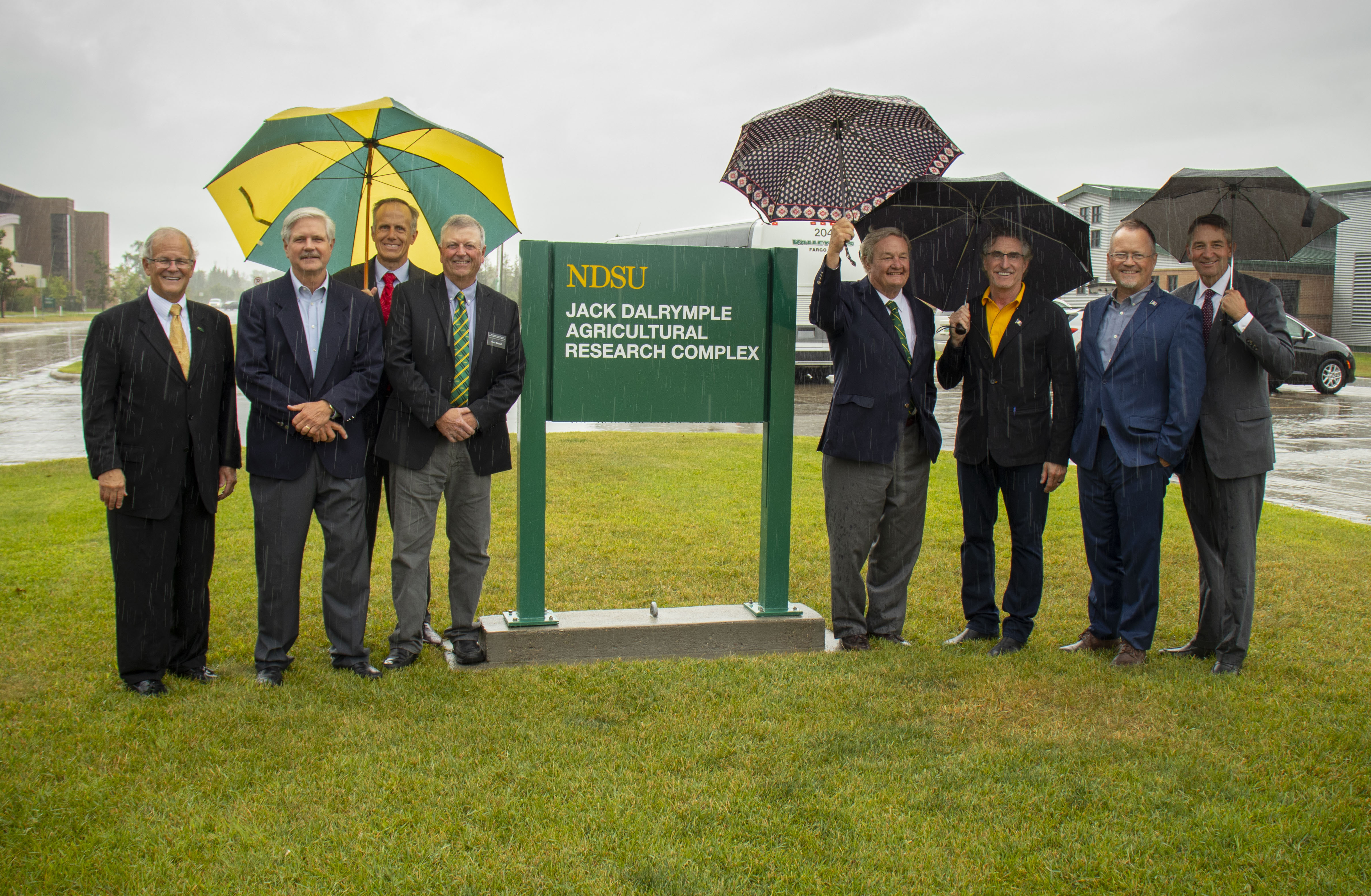 NDSU's state-of-the-art greenhouse complex now is the Jack Dalrymple Agricultural Research Complex. (L to R): NDSU President Dean Bresciani, Senator John Hoeven, Vice President for Agricultural Affairs Greg Lardy, SBARE Chair Mark Birdsall, former Governor Jack Dalrymple, Governor Doug Burgum, Lieutenant Governor Brent Sanford and former Lieutenant Governor Drew Wrigley. (NDSU Photo)