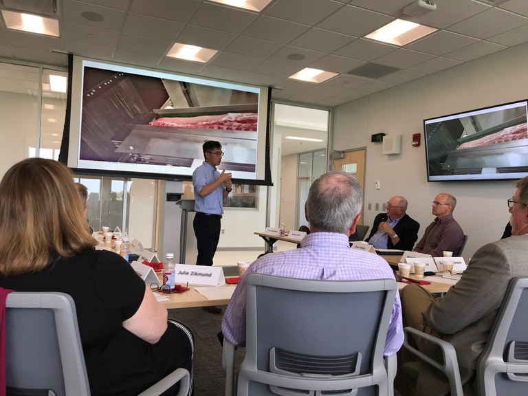 Rex Sun, an assistant professor in NDSU's Agricultural and Biosystems Engineering Department, gives a presentation to members of the North Dakota State Board of Agricultural Research and Education. (NDSU photo)