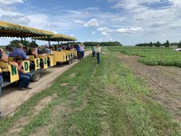 NDSU plant pathologist Michael Wunsch speaks to visitors about plant pathology projects during the Carrington Research Extension Center's 2019 field day. (NDSU photo)