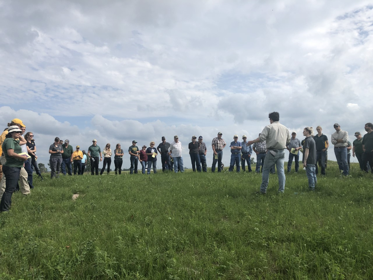 Kevin Sedivec, director of the Central Grasslands Research Extension Center, talks to visitors during a field day at the center. (NDSU photo)