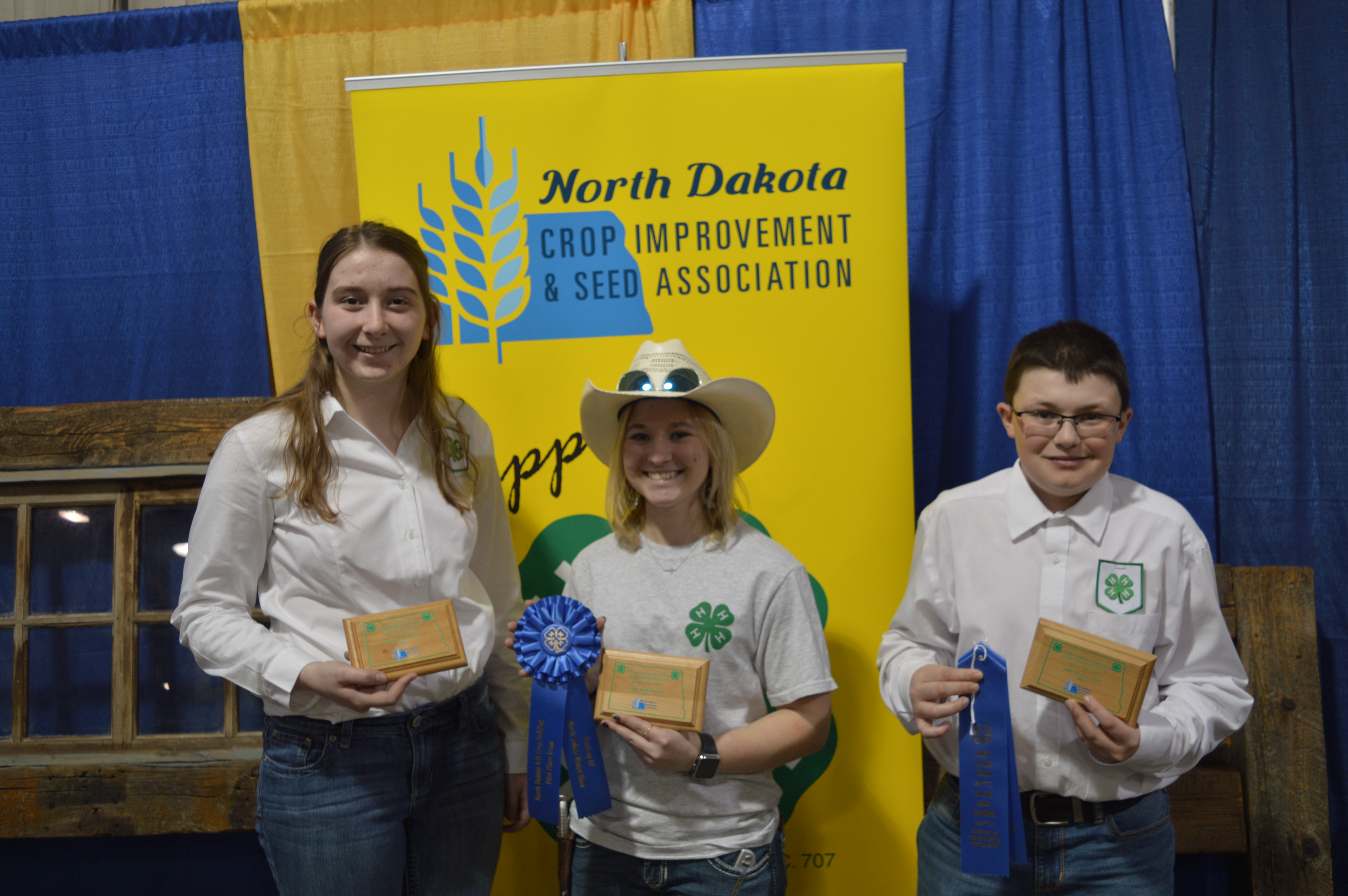This team takes first place in the senior division of the North Dakota state 4-H crop judging contest in Valley City. Pictured are team members (from left) Laura Muggli, Olivia Throener and Wyatt Kessel. (NDSU photo)