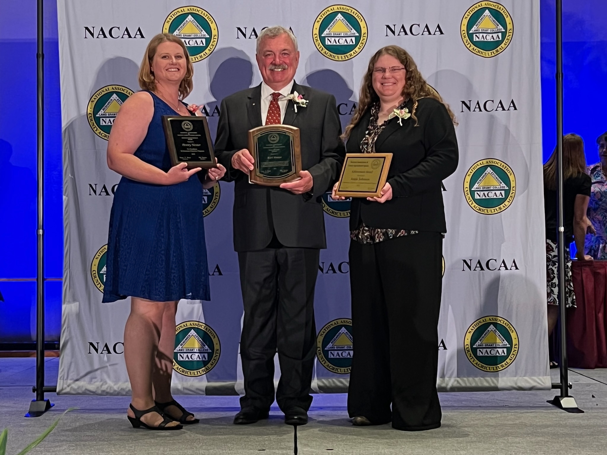 Penny Nester, Karl Hoppe and Angie Johnson were honored for their Extension work and service at the National Association of County Agricultural Agents' conference. (NDSU photo)