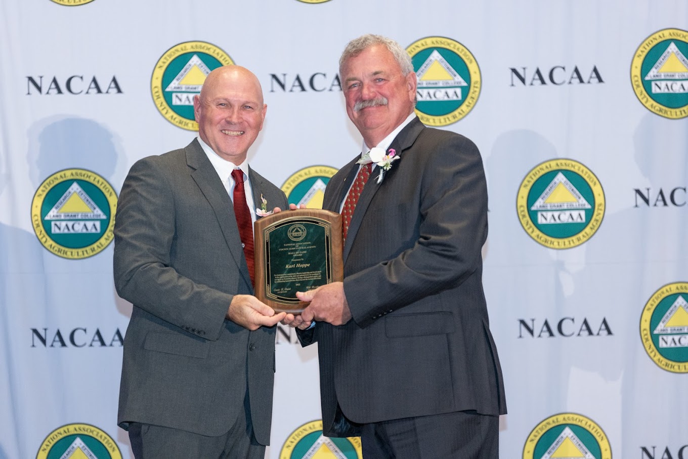 Karl Hoppe, right, is named to the National Association of County Agricultural Agents Hall of Fame. (Photo courtesy of NACAA)