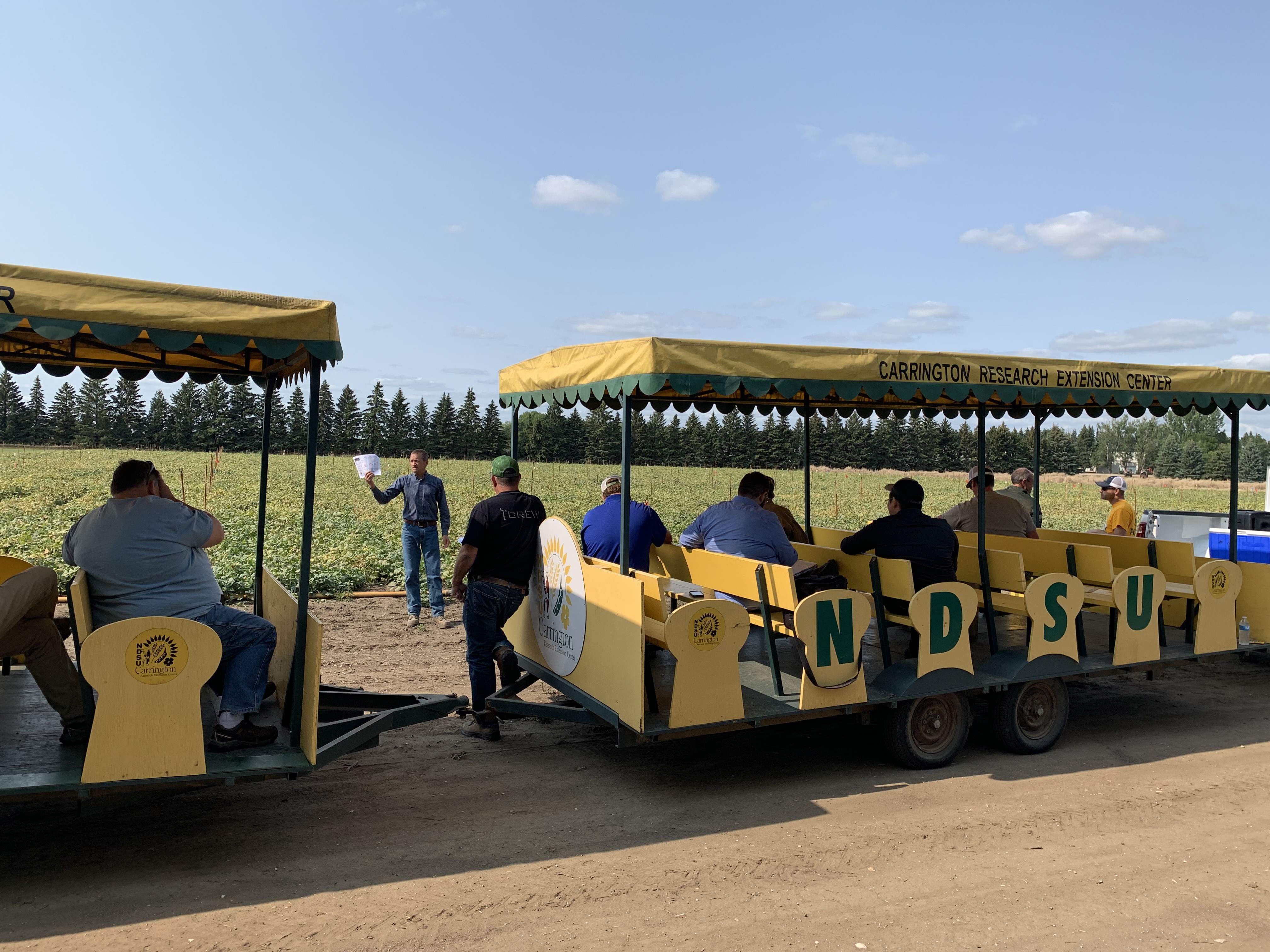 NDSU plant pathologist Michael Wunsch presents at last year’s row crop tour. (NDSU photo)