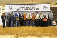 Tyler Goplen, a junior in agricultural economics from Canby, Minnesota, was named the overall showman at the 96th Little International at North Dakota State University (NDSU) on Feb. 12.  Pictured L to R: Gabby Nemitz, beef superintendent; Jim Hennessy, swine judge; Jake Aanden, dairy judge; Zac Hall, beef judge; Jackie Buckley, Little I Agriculturist of the Year;  Ashlyn Dilley, Little I manager; Goplen; Jade Koski, Little I assistant manager; Hope Willson, Little I queen;  Joy Dahlen, Little I princess; Brooke Kunz, Little I princess; and Brian Schermerhorn, sheep judge.