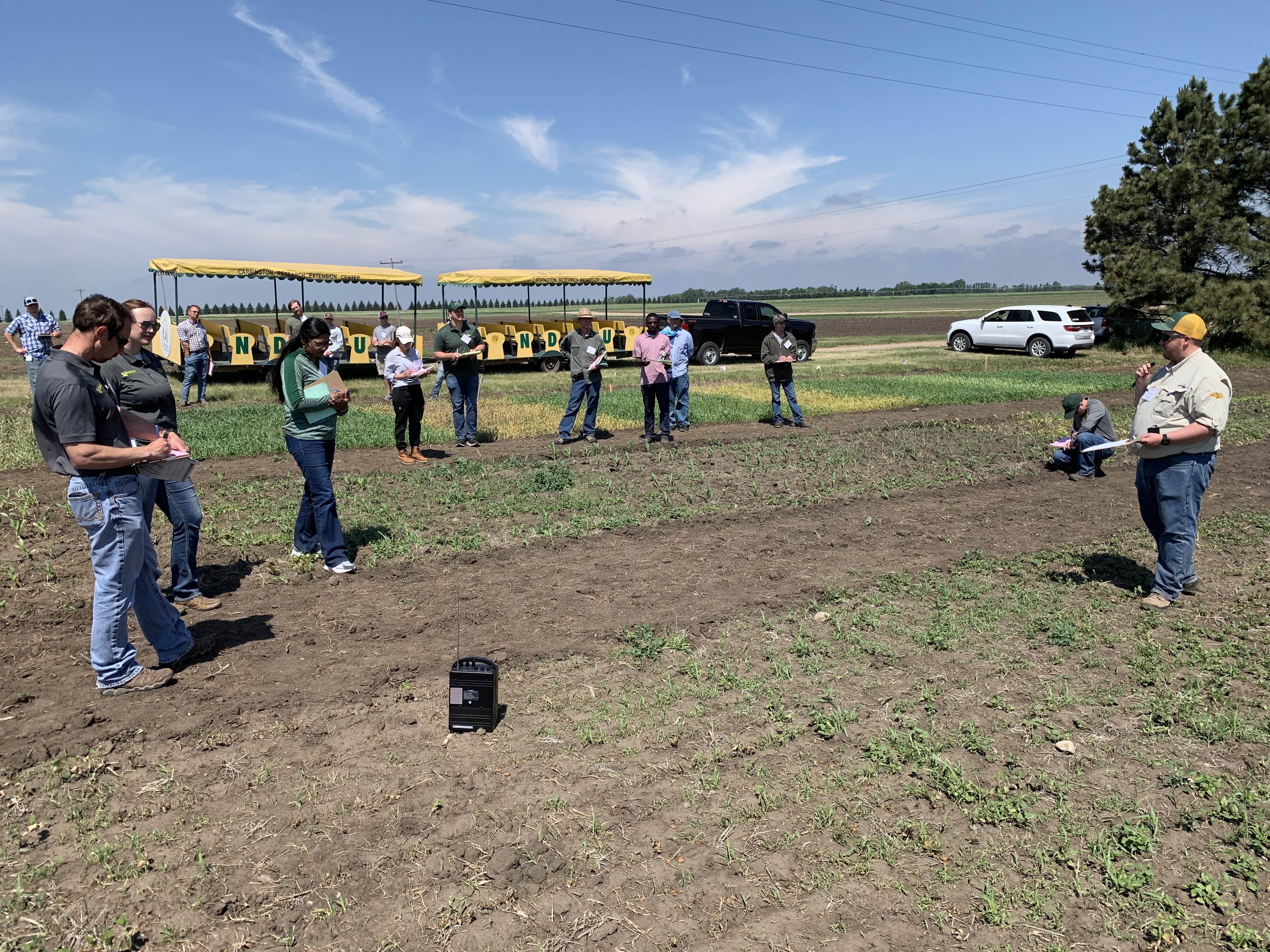Participants receive updates on crop pest and soil management recommendations during NDSU Extension's annual crop management field school. (NDSU photo)