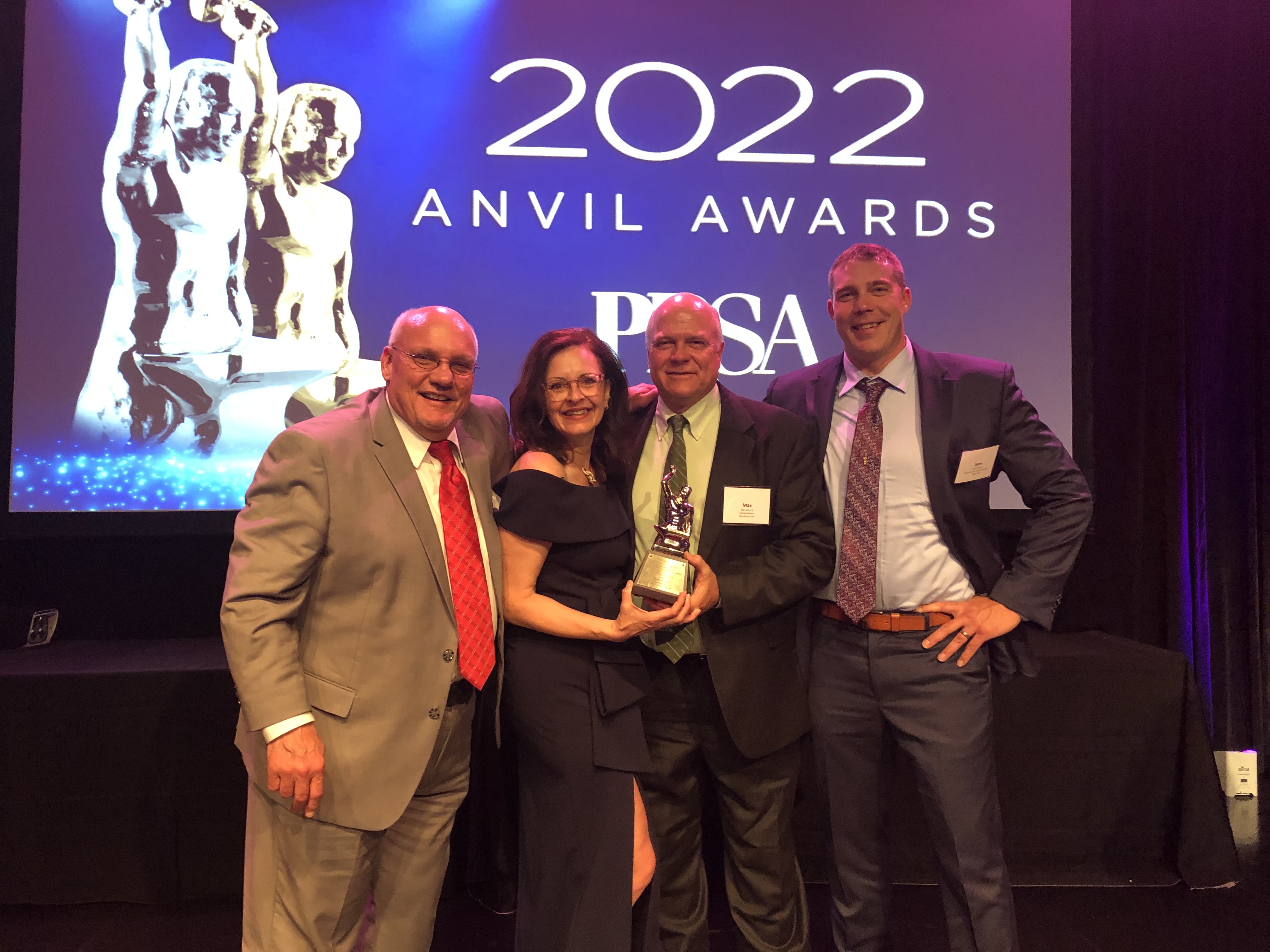 NDSU Extension plant pathologist and SCN Coalition leader Sam Markell (far right) attends the Public Relations Society of America’s celebration honoring Silver Anvil Award winners. Others photographed are (left to right): Greg Tylka, nematologist at Iowa State University; Max Wenck, MorganMyers; and Julianne Johnston, MorganMyers. (Photo courtesy of Morgan Myers)