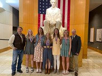 The Oliver County range judging team placed third in the nation. Team members were, left to right, coach Kevin Sedivec, Katie Frank, Breanna Vosberg, Reanna Schmidt, Elena Sorge, Rylee Hintz and coach Rick Schmidt. (NDSU photo)