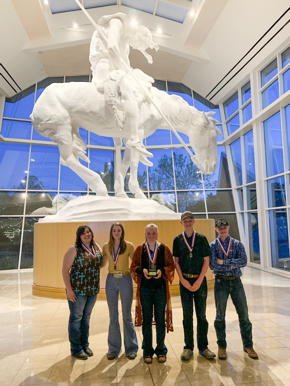 McKenzie County's team placed fourth overall in range judging. Team members were, from left to right, coach Devan Leo, Sylvia Boekelman, Paige Delaney, Luke Smith and Ryan Pingel. (NDSU photo)