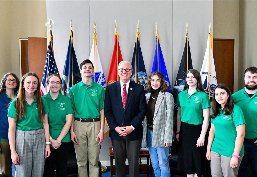 The 4-H Pollinator Habitat Ambassadors for North Dakota meet Senator Kevin Cramer. Pictured from left to right are chaperone Laura Devick, Kaylee Kemp, Sarah Potts, Sam Devick, Senator Cramer, Katherine Troutman, Hannah Myrdal, Katherine Arnold and chaperone Brenden Klebe.