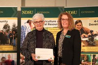 State Senator Joan Heckaman (L) received NDSU Extension's Friend of Extension award. Pictured with Jodi Bruns (R), NDSU leadership and civic engagement specialist and president of Upsilon chapter of Epsilon Sigma Phi.