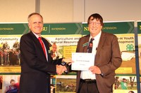 Brad Brummond, Extension agent from Walsh County, is honored for 40 years of service. (NDSU photo)