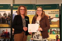 NDSU Extension agent Rachel Wald (R) received the Early Career Service Award. Pictured with Jodi Bruns (L), NDSU leadership and civic engagement specialist and president of Upsilon chapter of Epsilon Sigma Phi.