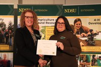 NDSU Extension agent Kari Helgoe (R) received the Visionary Leadership Award. Pictured with Jodi Bruns (L), NDSU leadership and civic engagement specialist and president of Upsilon chapter of Epsilon Sigma Phi.