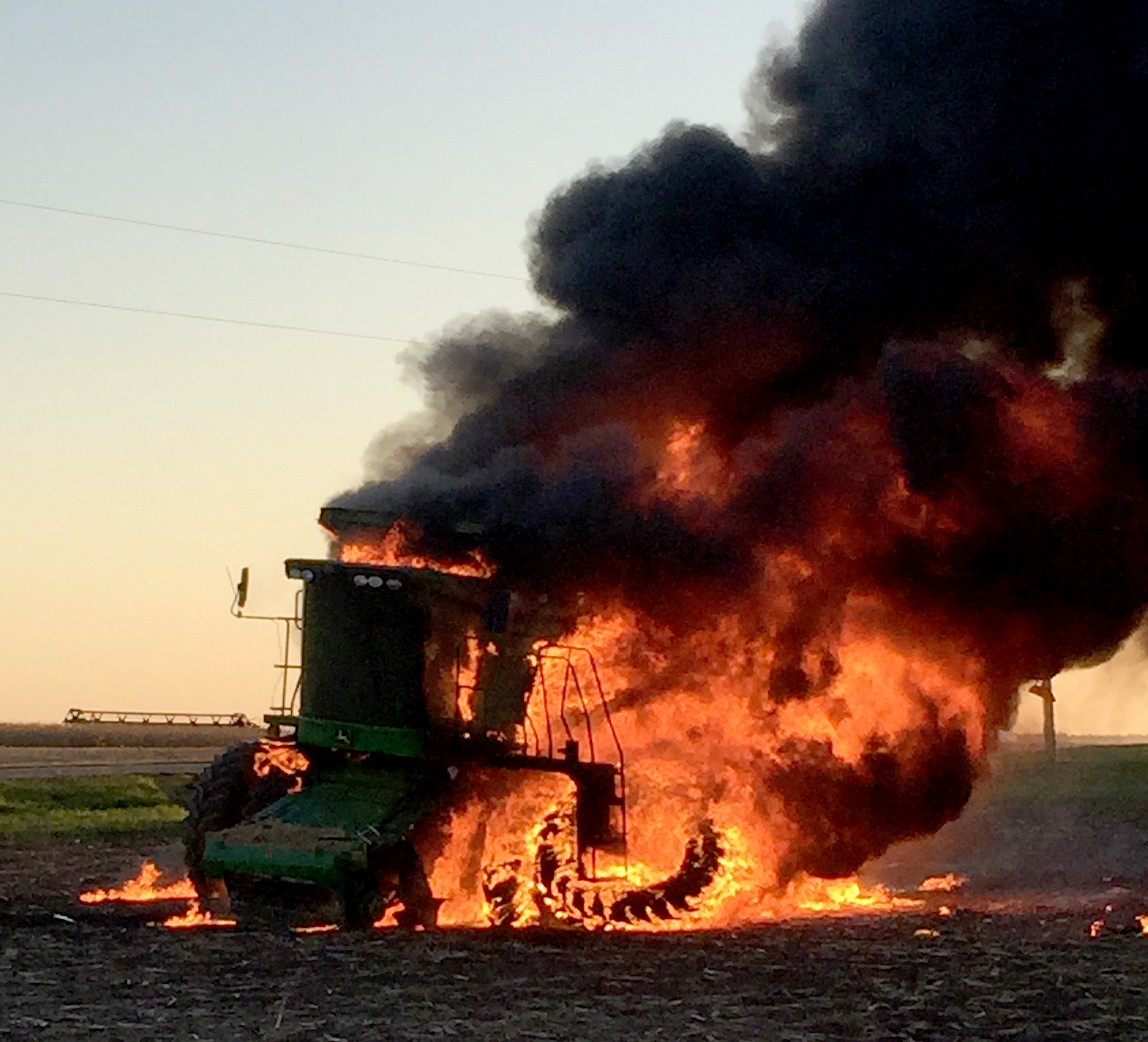 Warm, dry harvest conditions in combination with high winds increase the risk of combine fires. (Purdue University photo)