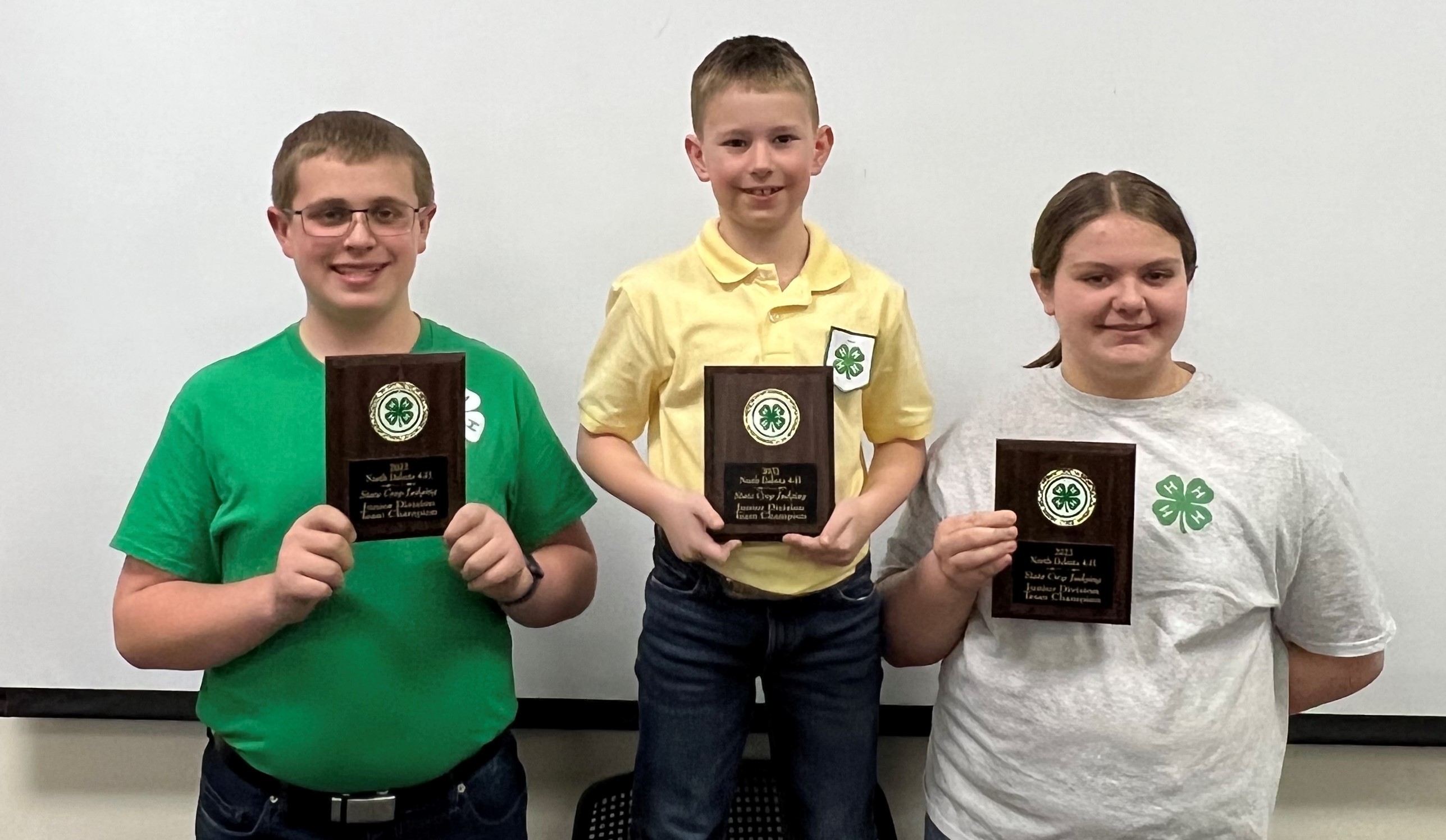 The Foster County 4-H crop judging team of Jackson Topp, Brant Klein and Kenleigh Henrichs placed first in the junior division of the state 4-H crop judging contest. (NDSU photo)