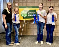 Junior Team: First Place Junior Team: Dunn County Pictured left to right: Kirsten Kukla – Dunn County NDSU Extension Agent and coach, Layna Dvorak, Landry Dvorak and Clover Norby