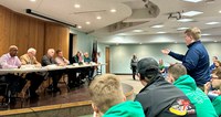 Bridger Rivinius, 4-H member from Stutsman County, stands to ask a question of North Dakota legislators during a panel discussion. (NDSU photo)