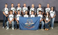North Dakota 4-H teams earned recognition in the 4-H National Shooting Sports Championships. Pictured are, from left, front row: Ty Awender, coach Pat Awender, coach Josh Entzel, coach Jim Gebhardt, coach Brent Christ, Trace Christ, coach Lee Hetletvedt and coach Penny Hetletvedt; front row: Kadin Beneke, Kaden Schafer, Josh Entzel, Jack Gebhardt, Bennet Schuler and Hatley Hetletved.