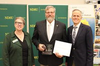 N.D. Rep. Tracy Boe received NDSU’s Friend of Extension award. Pictured are Lynette Flage, associate director of NDSU Extension; Rep. Boe and Greg Lardy, vice president of NDSU Agricultural Affairs. (NDSU photo)