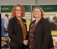 NDSU Extension agent Penny Nester (right) received the Mid-Career Service Award. She is pictured with Jodi Bruns, NDSU leadership and civic engagement specialist and president of Upsilon chapter of Epsilon Sigma Phi. (NDSU photo)