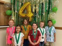 4-H Cloverbud members in Pembina County celebrate their Cloverbud Fair achievements during National 4-H Week. (NDSU photo)