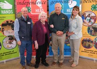 Duane Hauck is recognized as the 2024 Outstanding Lifetime Volunteer. Pictured are (from left): NDSU Extension agent Rick Schmidt, Millie Hauck, Duane Hauck, and North Dakota 4-H Foundation chair Becky Peterson. (NDSU photo)