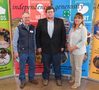Shane Giedd is recognized as the 2024 Volunteer of the Year. Pictured are (from left): NDSU Extension agent Rick Schmidt, Shane Giedd and North Dakota 4-H Foundation chair Becky Peterson. (NDSU photo)