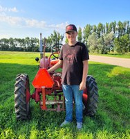Aaron Ward of Custer County, Montana, placed second for building a new sign holder and properly installing a slow-moving vehicle sign on an International Cub tractor. (Submitted photo)
