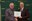 Karl Hoppe (left), NDSU Extension livestock systems specialist at NDSU's Carrington Research Extension Center, is honored for 35 years of service by Greg Lardy (right), Joe and Norma Peltier Vice President for Agriculture at NDSU. (NDSU photo)
