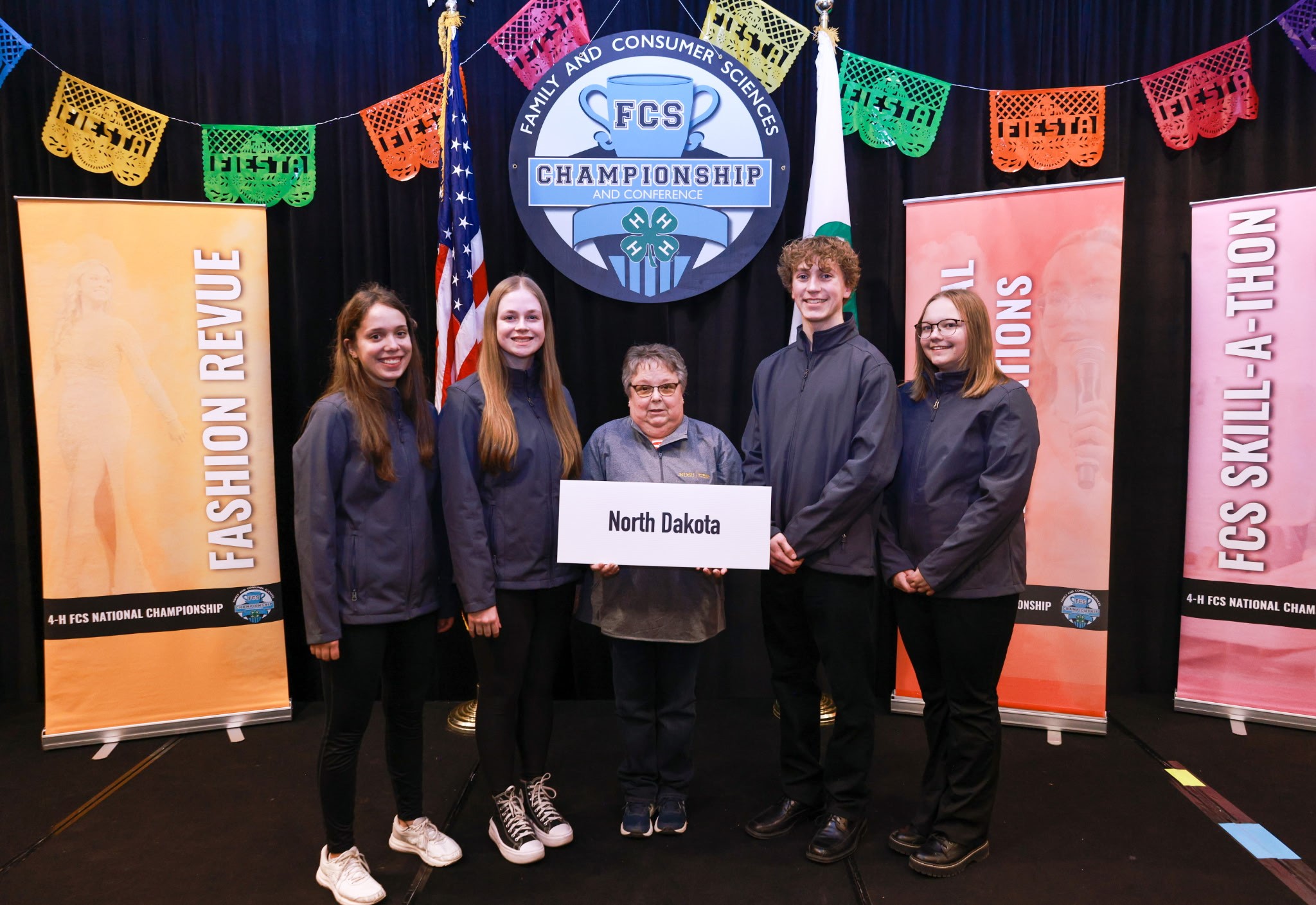 Cass County 4-H Senior Consumer Decision Making team: (left to right) Grace Burchill, West Fargo; Nora Severance, Hunter; Coach Rita Ussatis; Jack Kram, Fargo; Greta Olsen, Amenia (NDSU photo)
